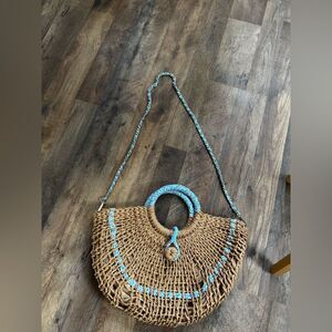 Straw Handmade Bag With Blue Accents and a removable Straps.